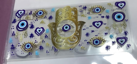 Blue eye in Gold Hand